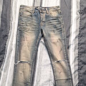 Men's Valabasas Mr. Flex Skinny Jeans in a faded blue wash. Size 30